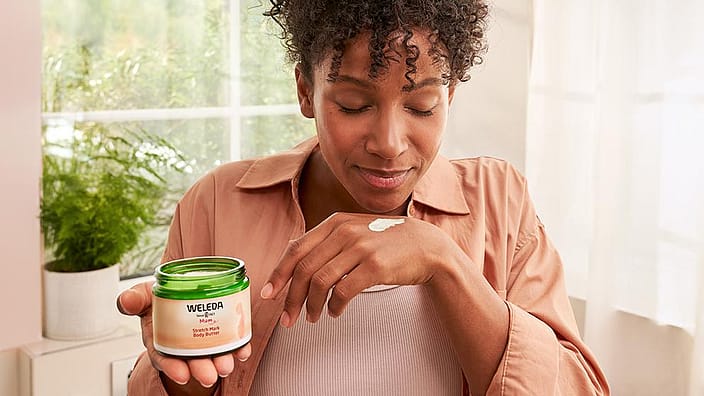 woman smells creme